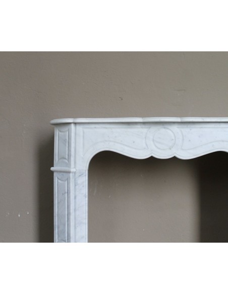 Very small and charming antique Pompadour Plat fireplace mantel carved in white Carrara marble.