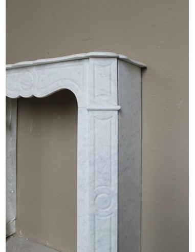 Very small and charming antique Pompadour Plat fireplace mantel carved in white Carrara marble.