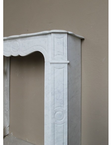 Very small and charming antique Pompadour Plat fireplace mantel carved in white Carrara marble.