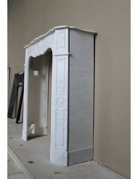 Very small and charming antique Pompadour Plat fireplace mantel carved in white Carrara marble.