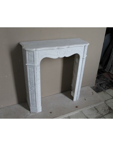 Very small and charming antique Pompadour Plat fireplace mantel carved in white Carrara marble.