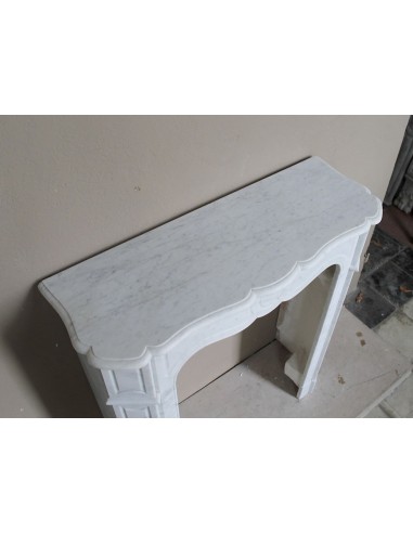 Very small and charming antique Pompadour Plat fireplace mantel carved in white Carrara marble.