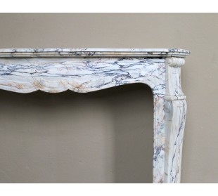 Antique Baroque mantel carved in rare Calacatta Gold marble with veining in shades of violet, gold, and white. 2
