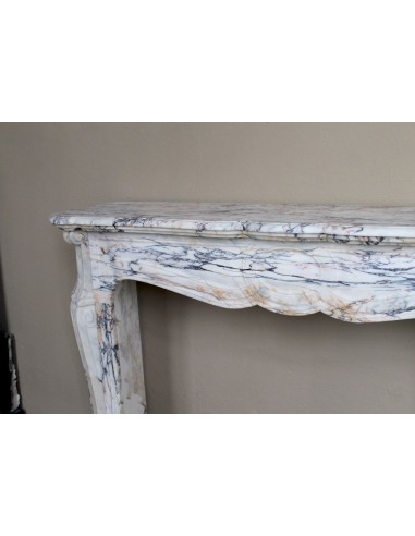 Antique Baroque mantel carved in rare Calacatta Gold marble with veining in shades of violet, gold, and white.