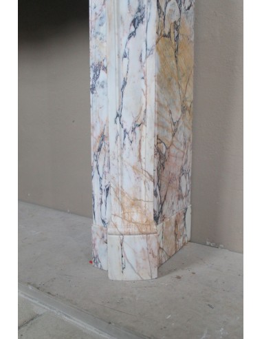 Antique Baroque mantel carved in rare Calacatta Gold marble with veining in shades of violet, gold, and white.