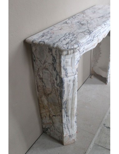 Antique Baroque mantel carved in rare Calacatta Gold marble with veining in shades of violet, gold, and white.