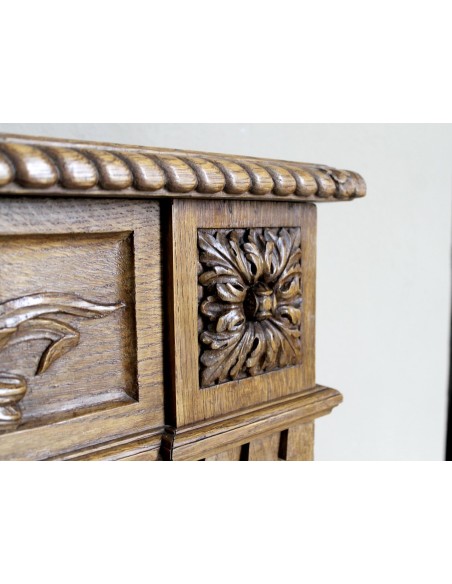 Charming small-scale Louis XVI “Olive Branch” fireplace mantel carved in oak wood, complete with insert and closure.