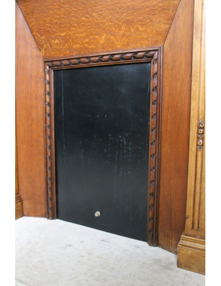 Charming small-scale Louis XVI “Olive Branch” fireplace mantel carved in oak wood, complete with insert and closure.