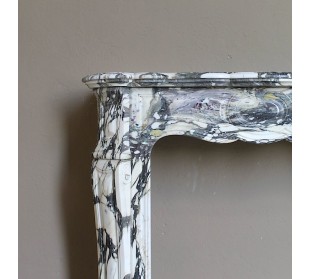 Louis XV “Pompadour” fireplace mantel in Breccia Medicea marble, featuring strong purple, green, gold and white veining. 2