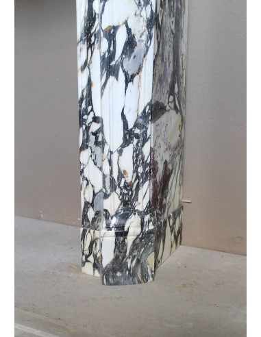 Louis XV “Pompadour” fireplace mantel in Breccia Medicea marble, featuring strong purple, green, gold and white veining.