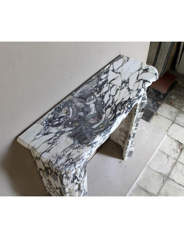 Louis XV “Pompadour” fireplace mantel in Breccia Medicea marble, featuring strong purple, green, gold and white veining.