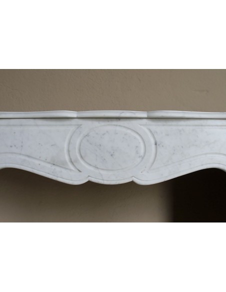 Antique baroque “Pompadour” mantelpiece in white marble of small and appealing size. A genuine, Parisian, iconic fire surround.