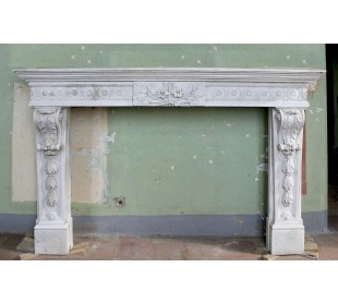 Exceptional large-scale Neoclassical fireplace carved in white Carrara marble. This model can also be found at Versailles.