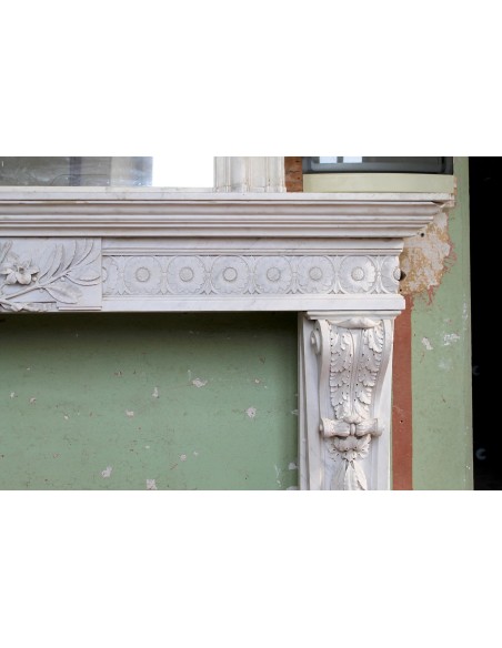 Exceptional large-scale Neoclassical fireplace mantel carved in white Carrara marble. This model can also be found at Versailles