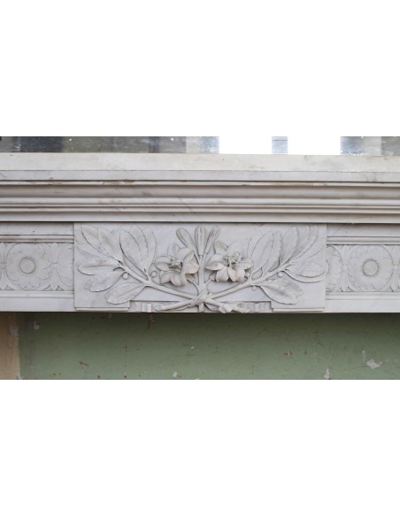 Exceptional large-scale Neoclassical fireplace mantel carved in white Carrara marble. This model can also be found at Versailles