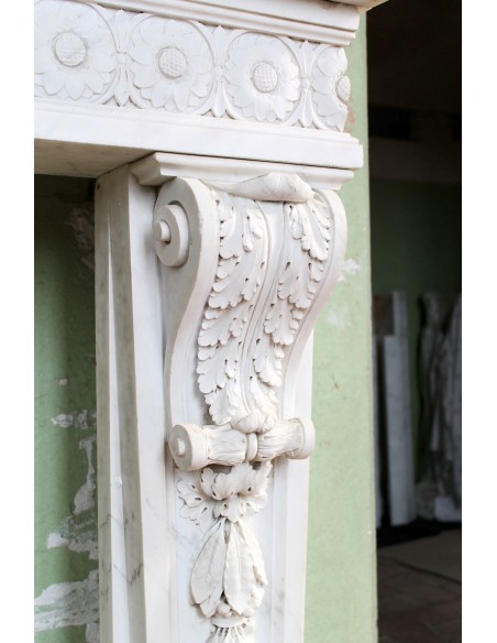 Exceptional large-scale Neoclassical fireplace mantel carved in white Carrara marble. This model can also be found at Versailles