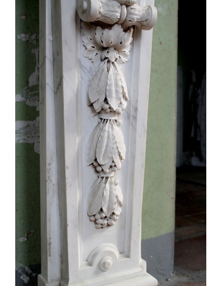 Exceptional large-scale Neoclassical fireplace mantel carved in white Carrara marble. This model can also be found at Versailles