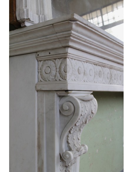 Exceptional large-scale Neoclassical fireplace mantel carved in white Carrara marble. This model can also be found at Versailles
