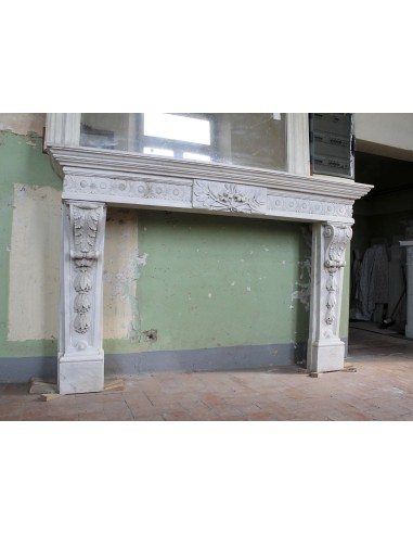 Exceptional large-scale Neoclassical fireplace mantel carved in white Carrara marble. This model can also be found at Versailles