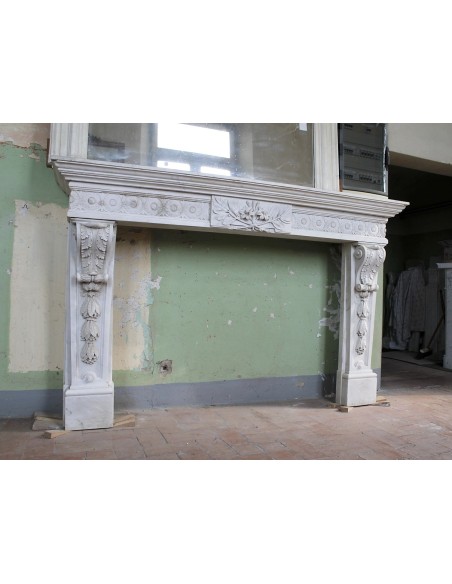 Exceptional large-scale Neoclassical fireplace mantel carved in white Carrara marble. This model can also be found at Versailles