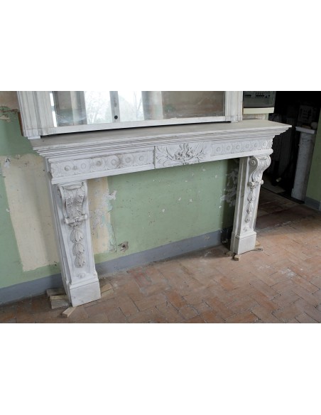 Exceptional large-scale Neoclassical fireplace mantel carved in white Carrara marble. This model can also be found at Versailles