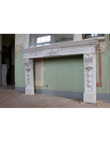 Exceptional large-scale Neoclassical fireplace mantel carved in white Carrara marble. This model can also be found at Versailles