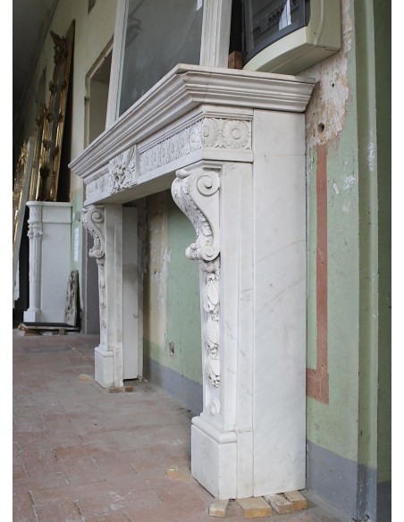 Exceptional large-scale Neoclassical fireplace mantel carved in white Carrara marble. This model can also be found at Versailles