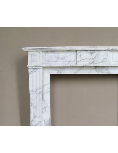 Large antique Neoclassical “Cannelure” fireplace mantel carved in beautifully veined white Arabescato marble.