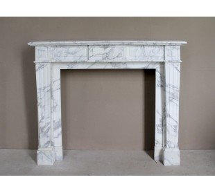 Large antique Neoclassical “Cannelure” fireplace mantel carved in beautifully veined white Arabescato marble.