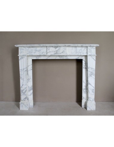 Large antique Neoclassical “Cannelure” fireplace mantel carved in beautifully veined white Arabescato marble.