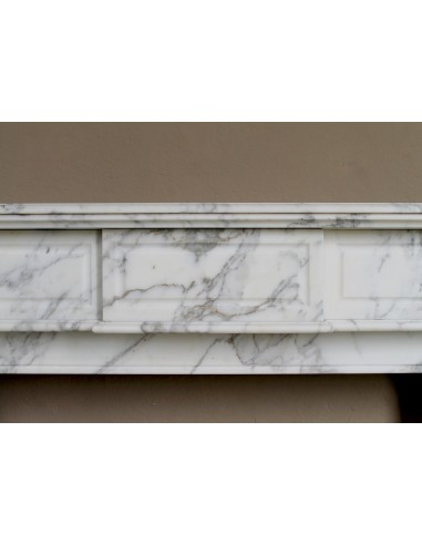 Large antique Neoclassical “Cannelure” fireplace mantel carved in beautifully veined white Arabescato marble.