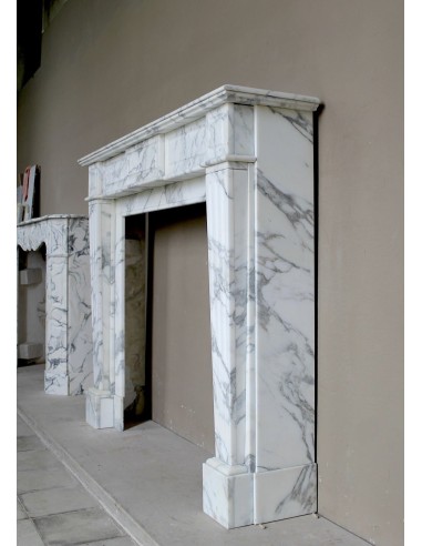 Large antique Neoclassical “Cannelure” fireplace mantel carved in beautifully veined white Arabescato marble.