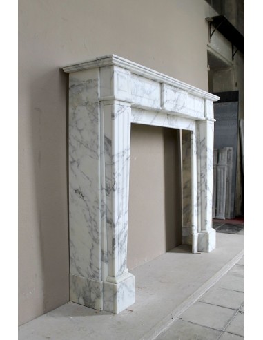 Large antique Neoclassical “Cannelure” fireplace mantel carved in beautifully veined white Arabescato marble.