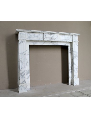 Large antique Neoclassical “Cannelure” fireplace mantel carved in beautifully veined white Arabescato marble.