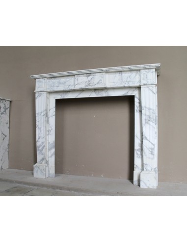 Large antique Neoclassical “Cannelure” fireplace mantel carved in beautifully veined white Arabescato marble.