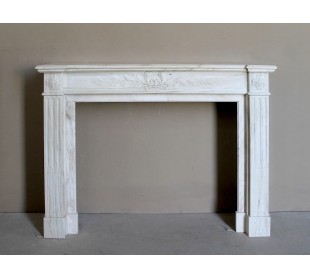 Antique Neoclassical fireplace mantel with olive branch decoration in Cremo Delicato marble, offered at a discounted price.