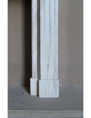 Antique Neoclassical fireplace mantel with olive branch decoration in Cremo Delicato marble, offered at a discounted price.