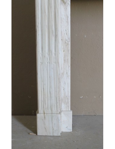 Antique Neoclassical fireplace mantel with olive branch decoration in Cremo Delicato marble, offered at a discounted price.