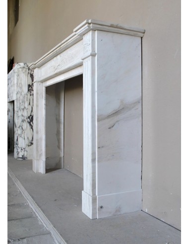 Antique Neoclassical fireplace mantel with olive branch decoration in Cremo Delicato marble, offered at a discounted price.