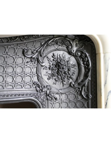 Important antique Louis XV “Coquille Bordelaise” fireplace mantel in rare Pavonazzo marble, with its original cast-iron insert.