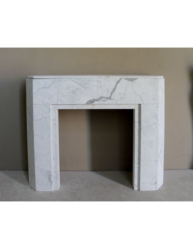 Beautiful antique Art Deco-style fireplace mantel carved in White veined Carrara marble.