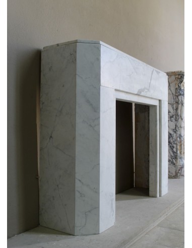 Beautiful antique Art Deco-style fireplace mantel carved in White veined Carrara marble.