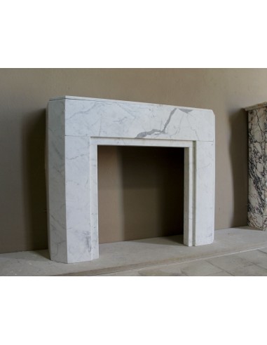 Beautiful antique Art Deco-style fireplace mantel carved in White veined Carrara marble.