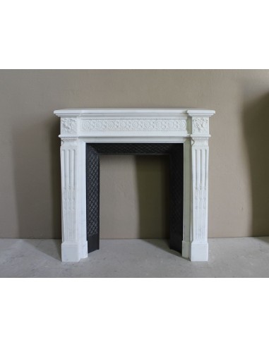 Exceptionally small and refined Neoclassical “Macaron” antique fireplace mantel in pristine Statuario white marble.