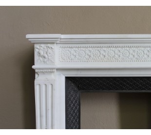 Exceptionally small and refined Neoclassical “Macaron” antique fireplace mantel in pristine Statuario white marble. 2