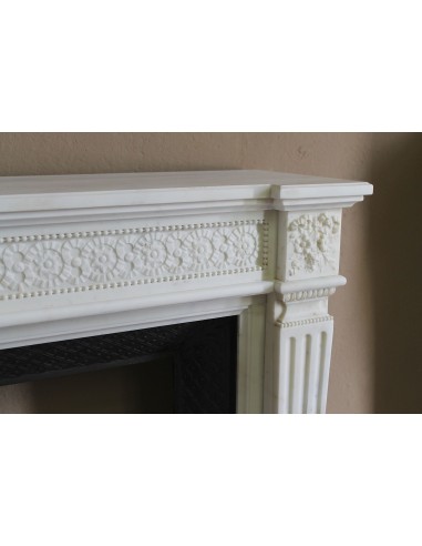 Exceptionally small and refined Neoclassical “Macaron” antique fireplace mantel in pristine Statuario white marble.