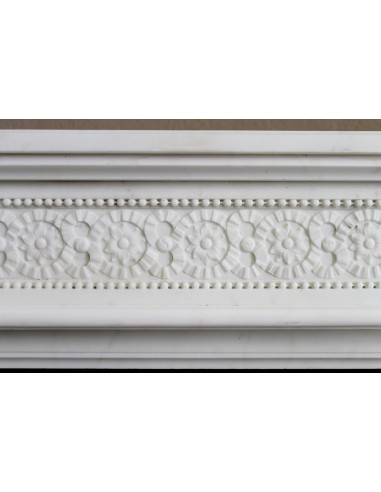 Exceptionally small and refined Neoclassical “Macaron” antique fireplace mantel in pristine Statuario white marble.