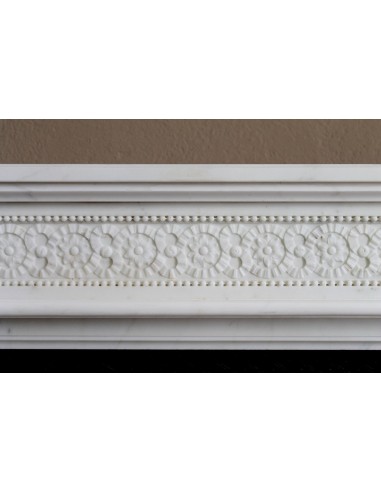 Exceptionally small and refined Neoclassical “Macaron” antique fireplace mantel in pristine Statuario white marble.