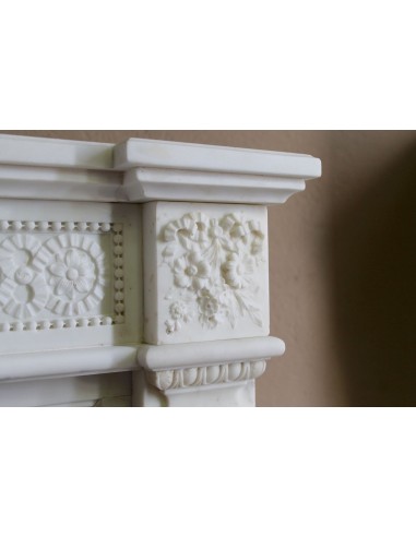 Exceptionally small and refined Neoclassical “Macaron” antique fireplace mantel in pristine Statuario white marble.