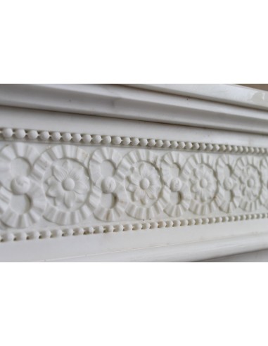 Exceptionally small and refined Neoclassical “Macaron” antique fireplace mantel in pristine Statuario white marble.